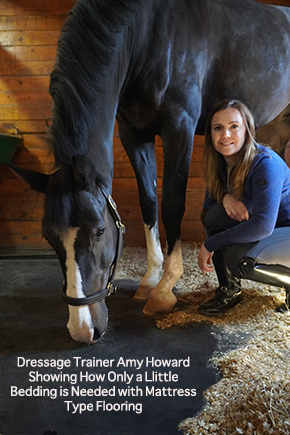 dressage trainer Amy Howard showing how only a little bedding is needed with mattress type flooring